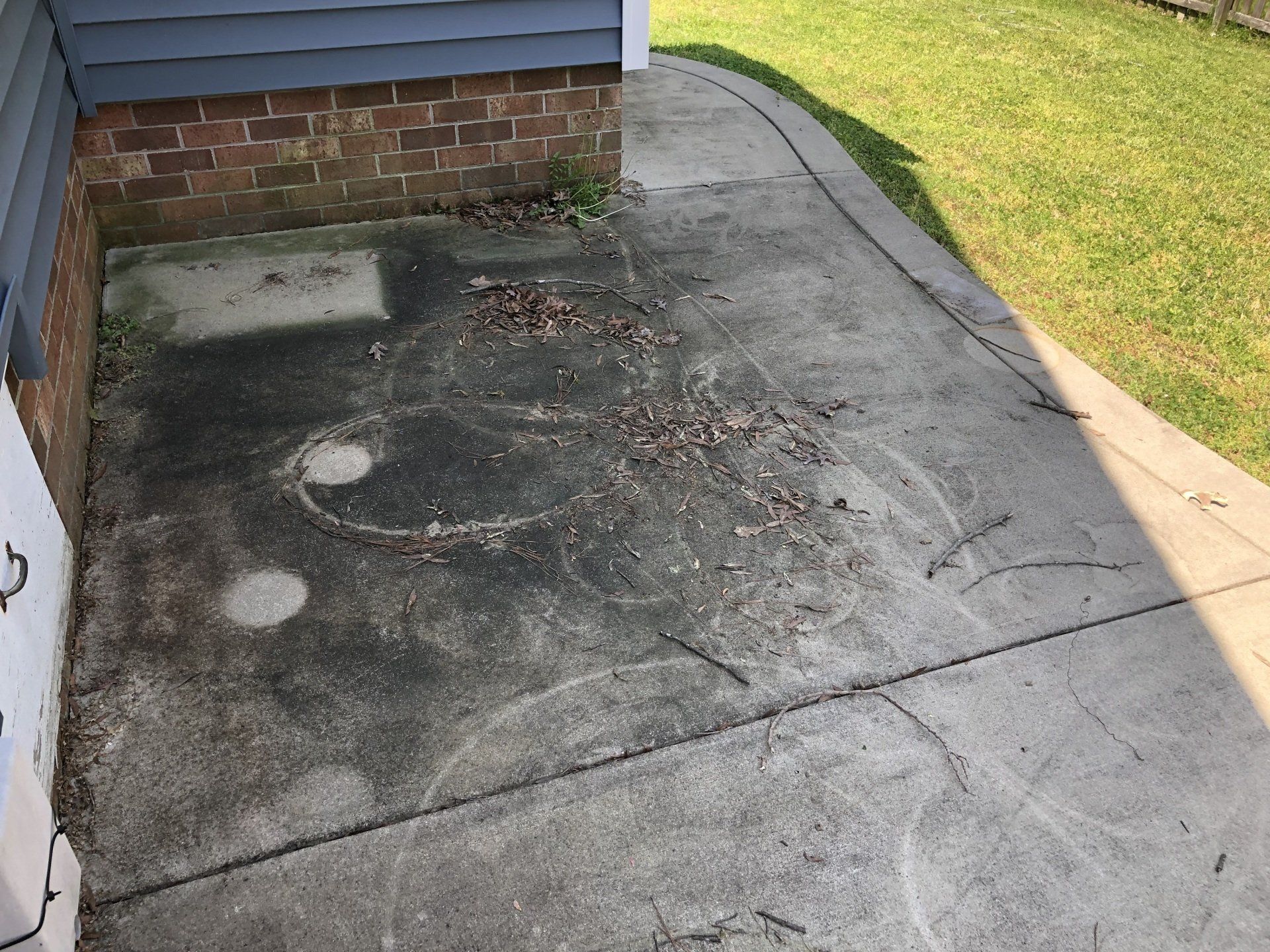 old dirty concrete floor with branches