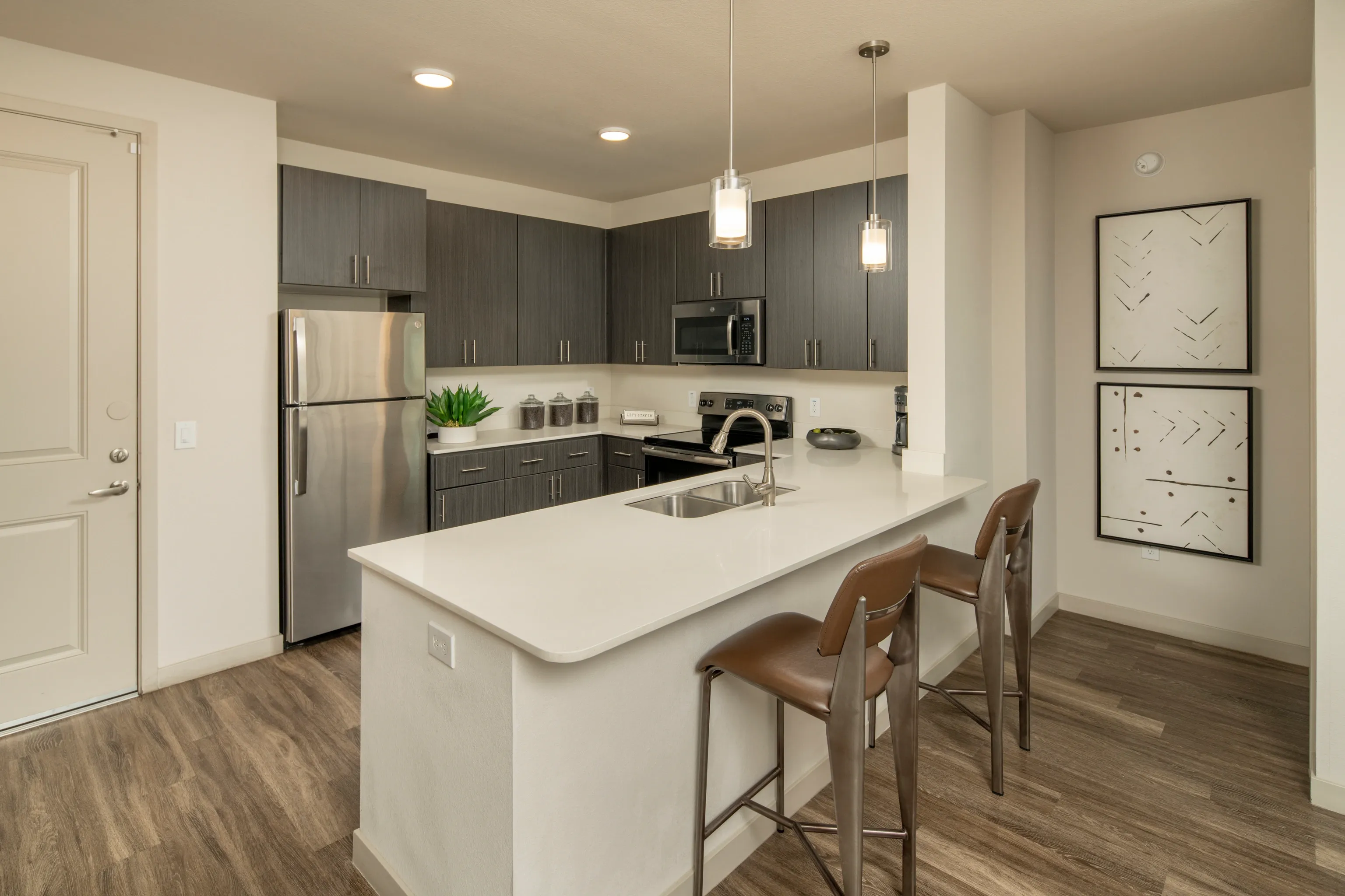 Apartment kitchen — representative home at Parc South Mountain.