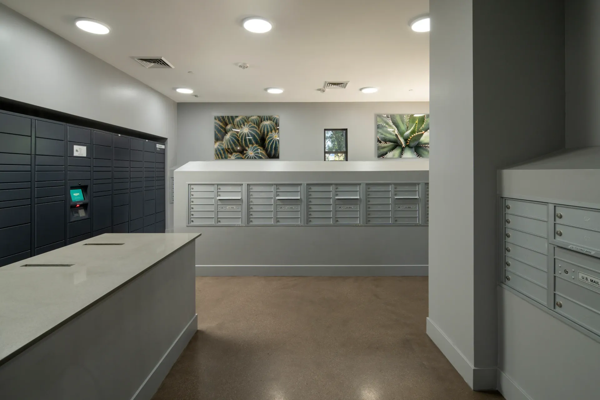 Mail room with package lockers and mailboxes at Parc South Mountain in Phoenix, AZ.