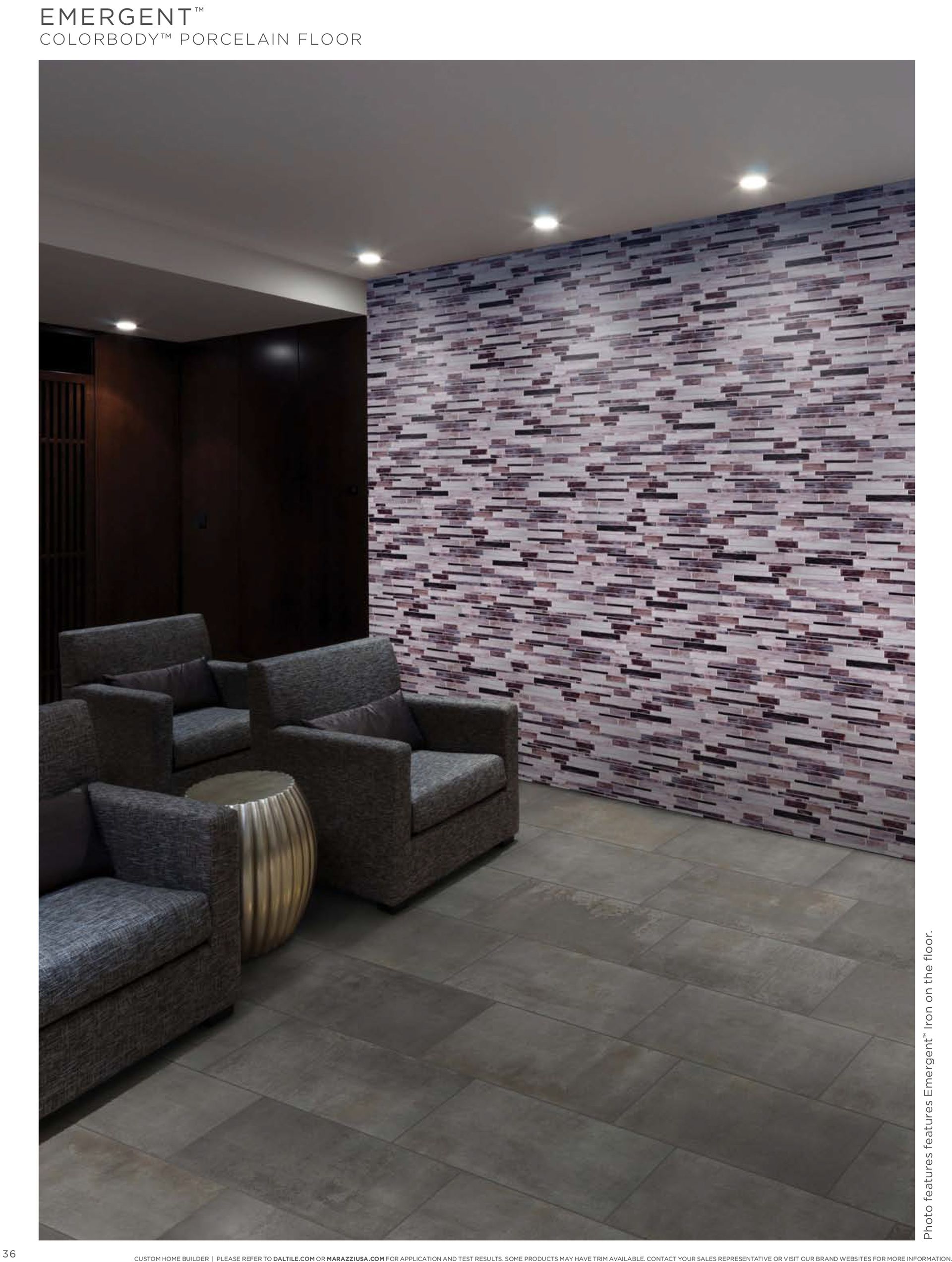 A living room with a brick wall and chairs.