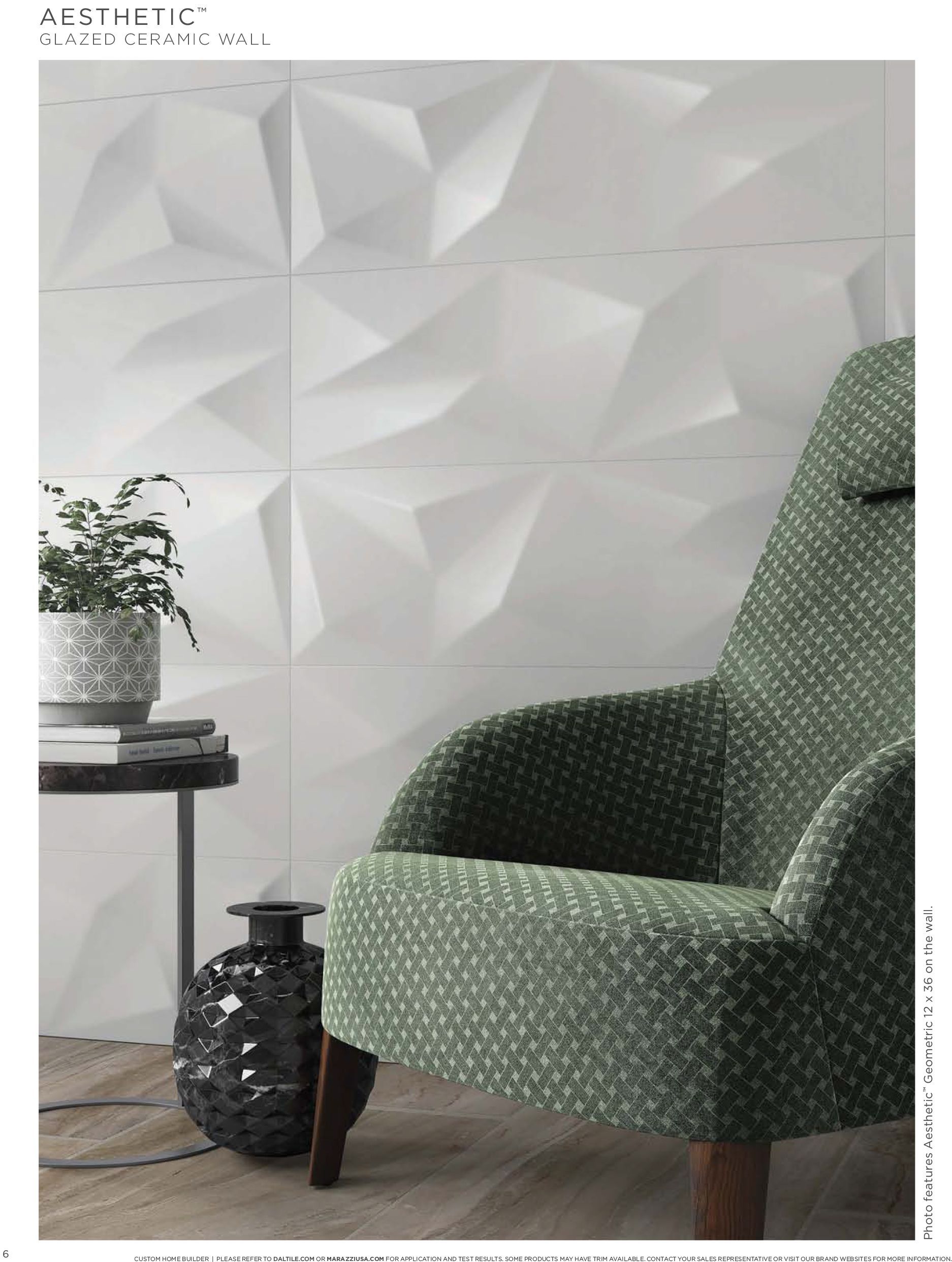 Tile wall | A green chair is sitting in front of a white wall.
