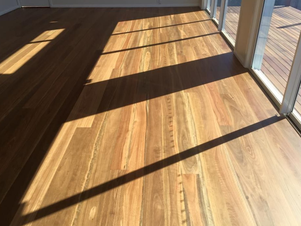 Wooden floor with shadows from sunlight — CM Timber Flooring in East Ballina, NSW