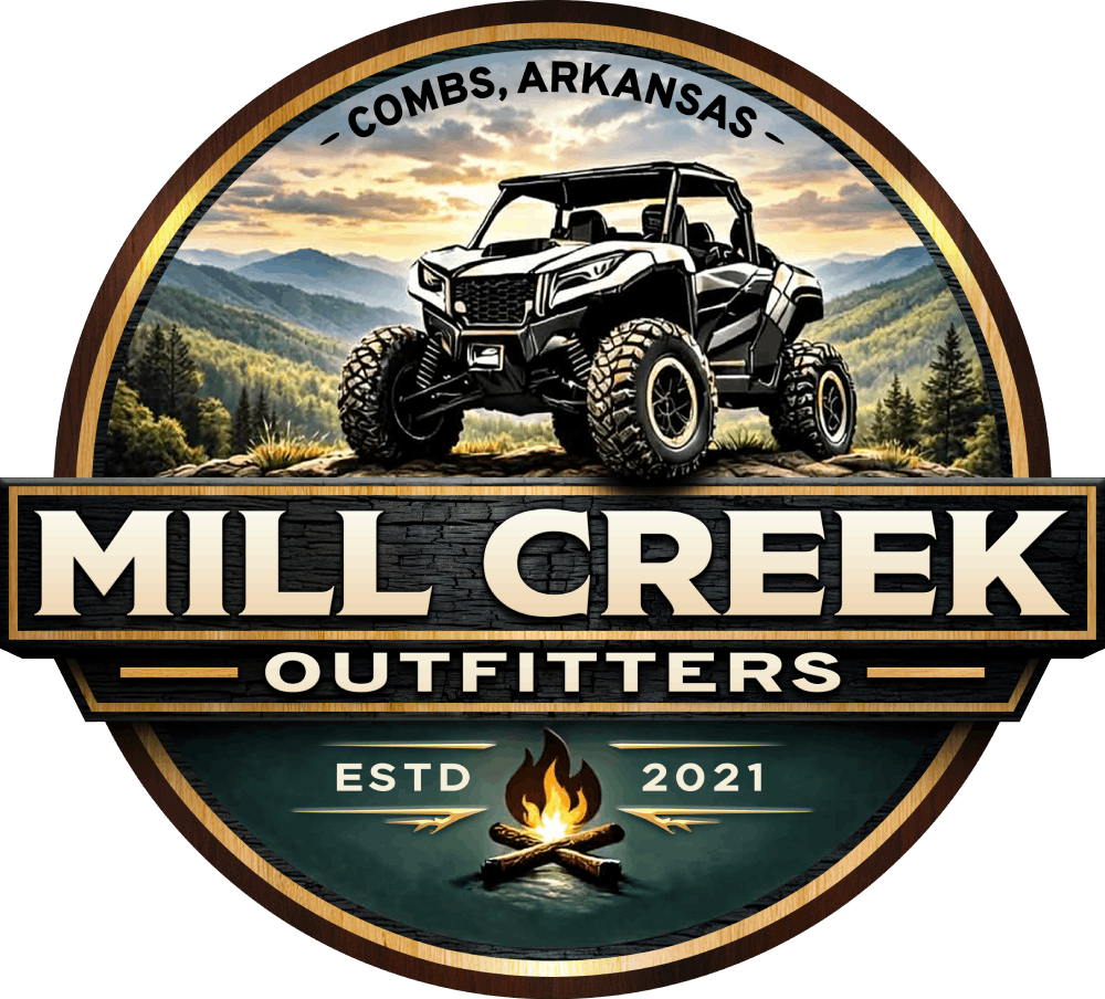 Mill Creek Outfitters logo with off-road truck, mountain sunset, and campfire; Combs, Arkansas, est. 2021