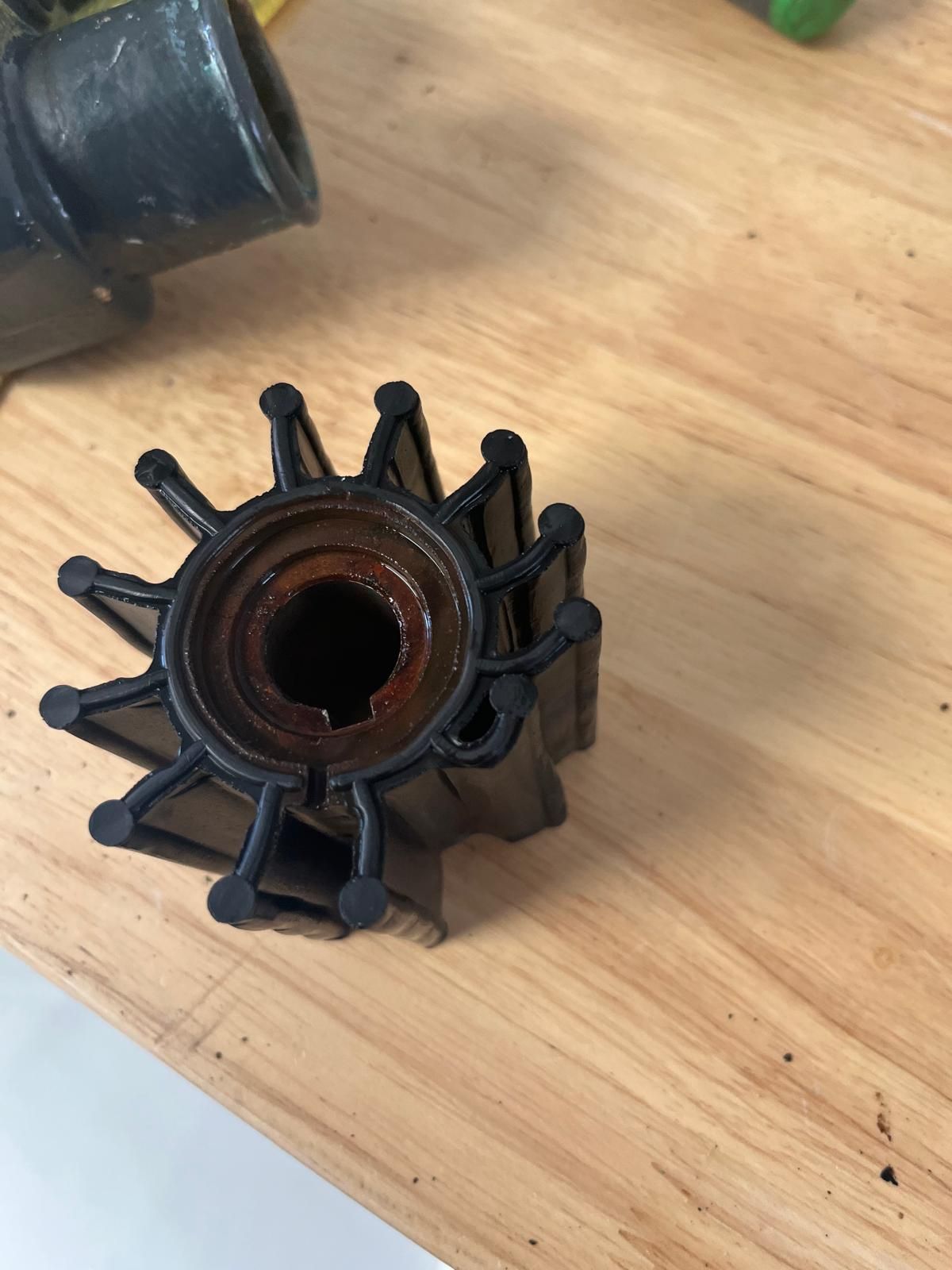 Black Plastic Mechanical Part — Ocean Mate Marine Services in Coomera, QLD