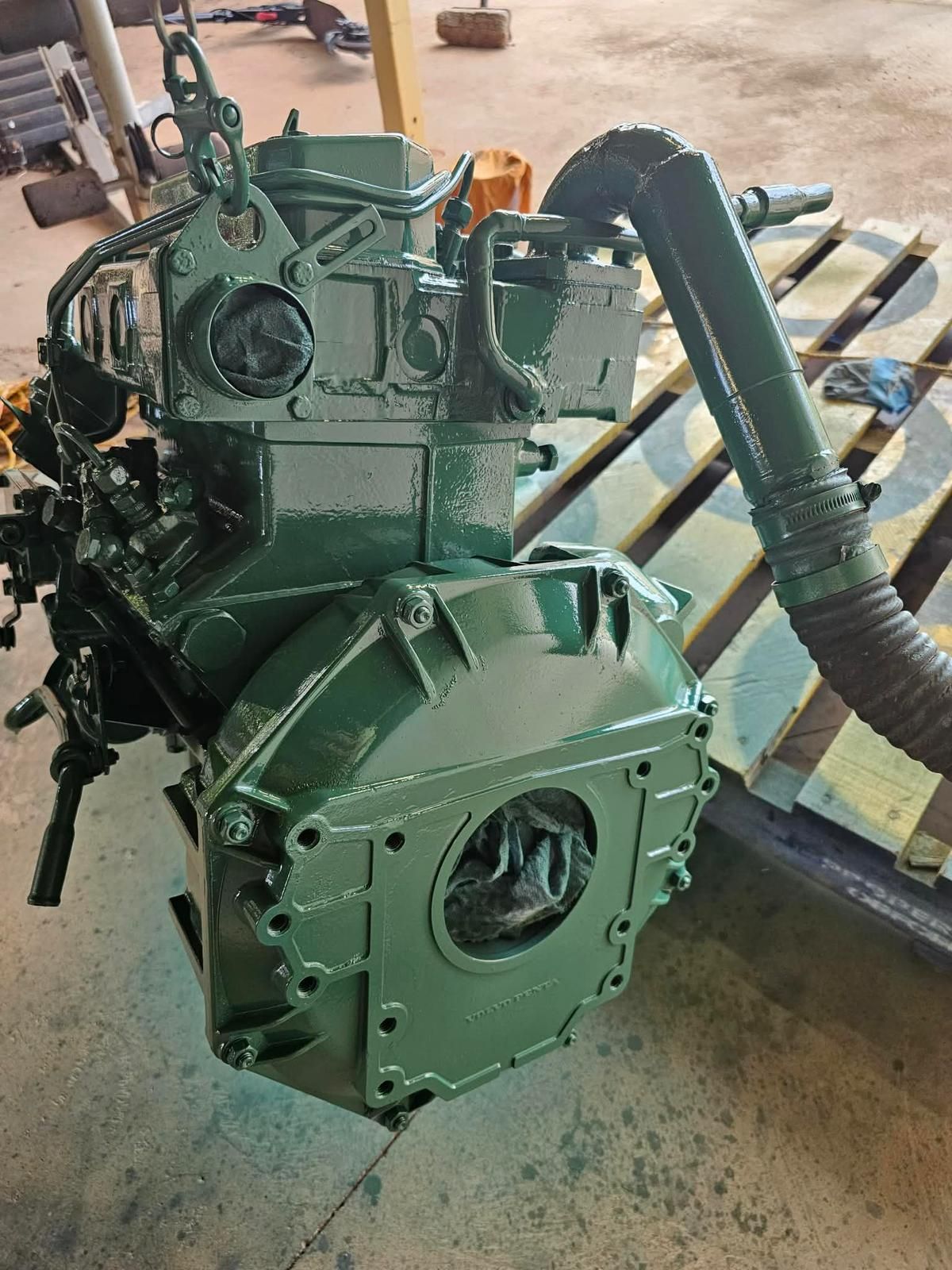 A Freshly Painted Dark Green Industrial Engine — Ocean Mate Marine Services in Coomera, QLD