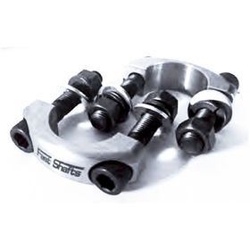 Silver automotive wheel spacer with black bolts on a white background