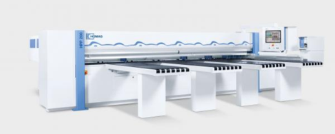 Large industrial printing machine with white-and-blue panels and a control screen in a factory setting