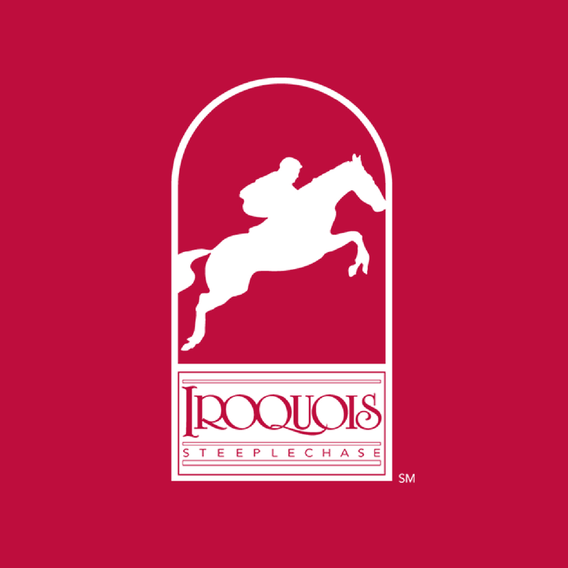 A logo for iroquois steeplechase shows a man riding a horse A logo for iroquois steeplechase shows a man riding a horse