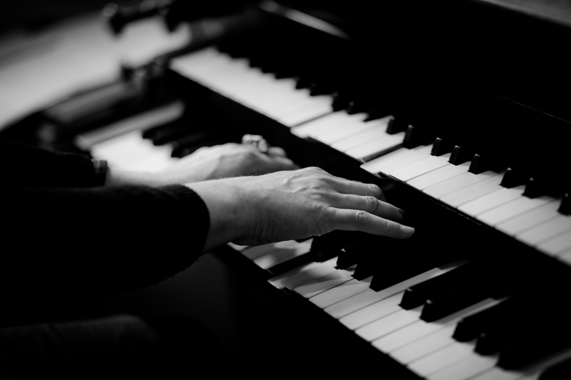 Photo of hands playing the piano