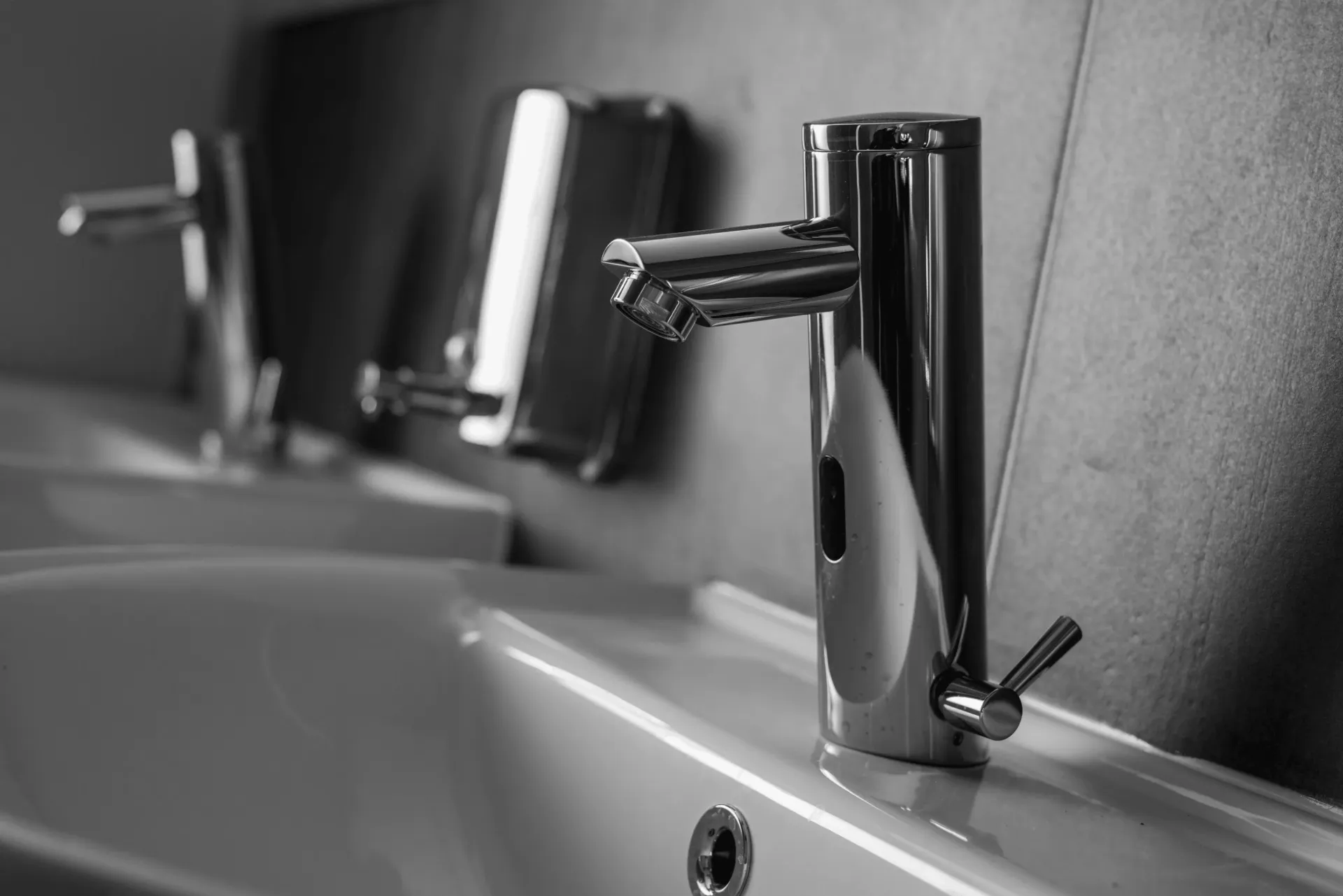 Hands-free touchless faucet installed in a commercial bathroom by Top Grade Plumbing in Bakersfield CA