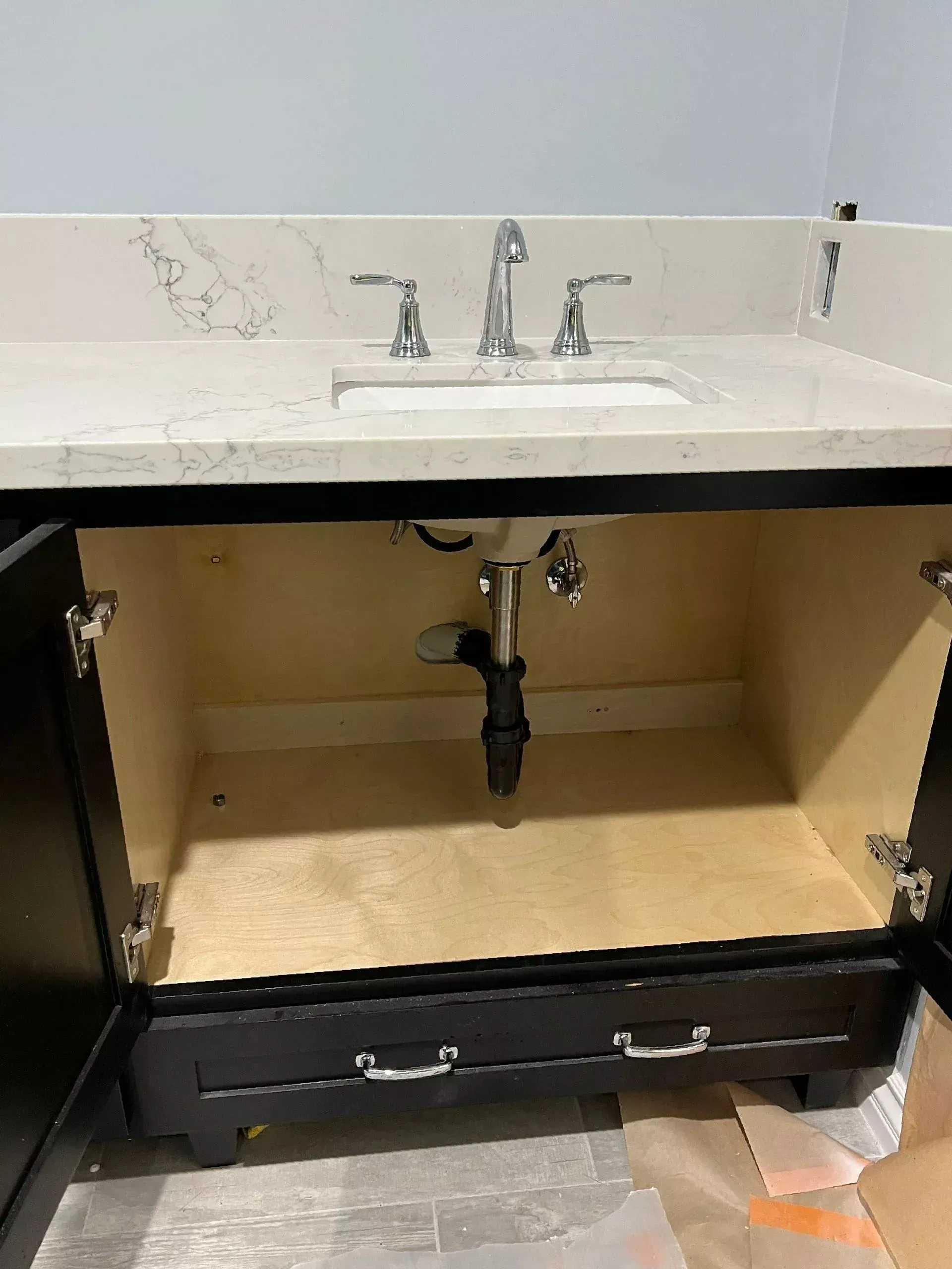 Bathroom sink and drain pipe installation serviced by a drain cleaning plumber in Bakersfield CA