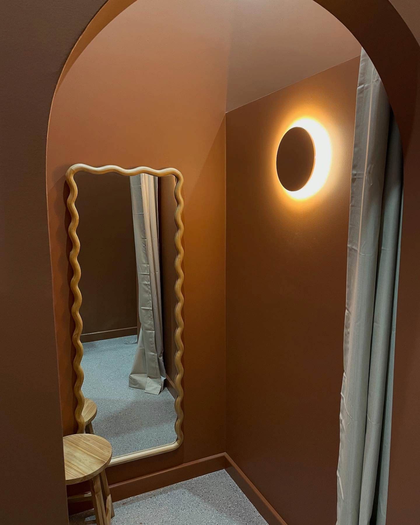 Fitting Room With a Wavy-edged Mirror — Switched On Electrics in Wagga Wagga, NSW