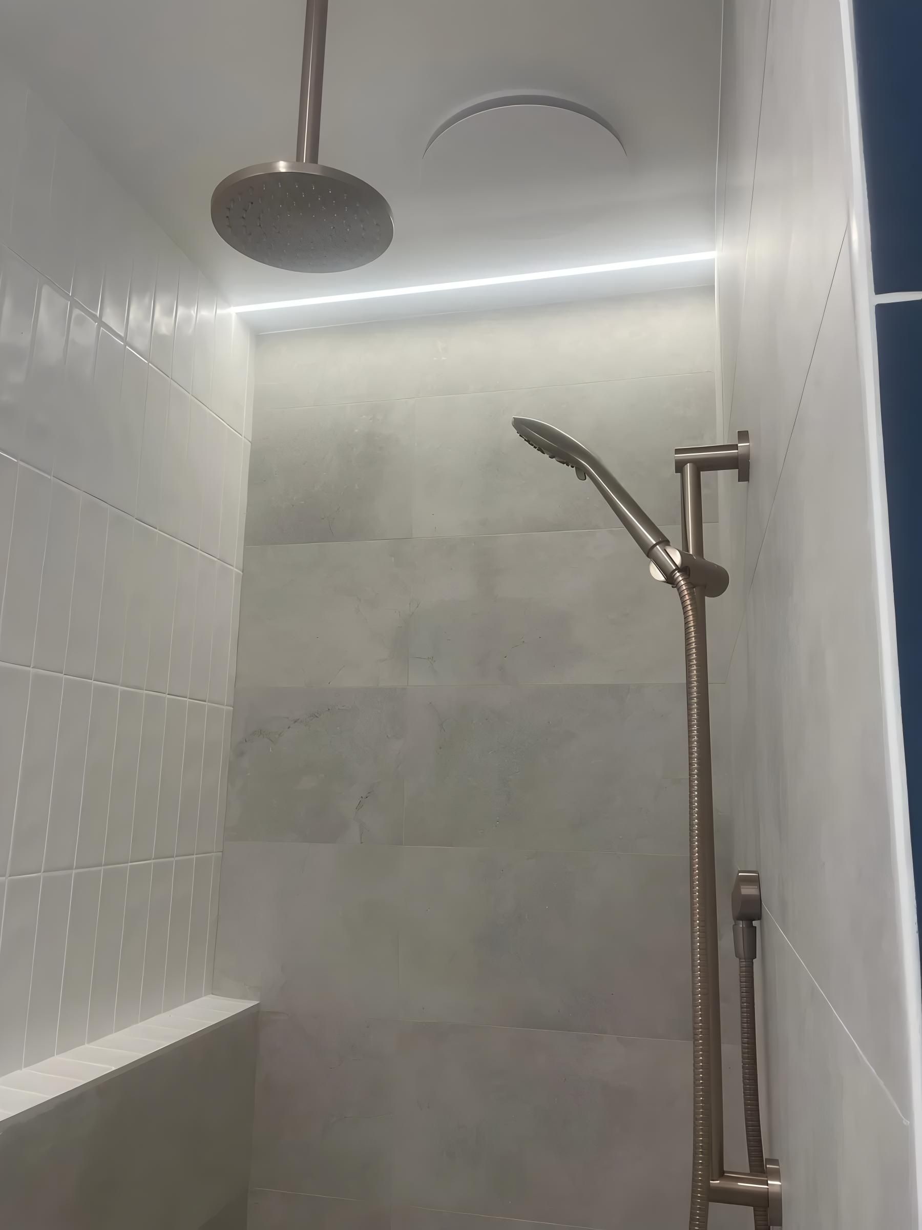 Shower Stall With Rose Gold Fixtures — Switched On Electrics in Wagga Wagga, NSW