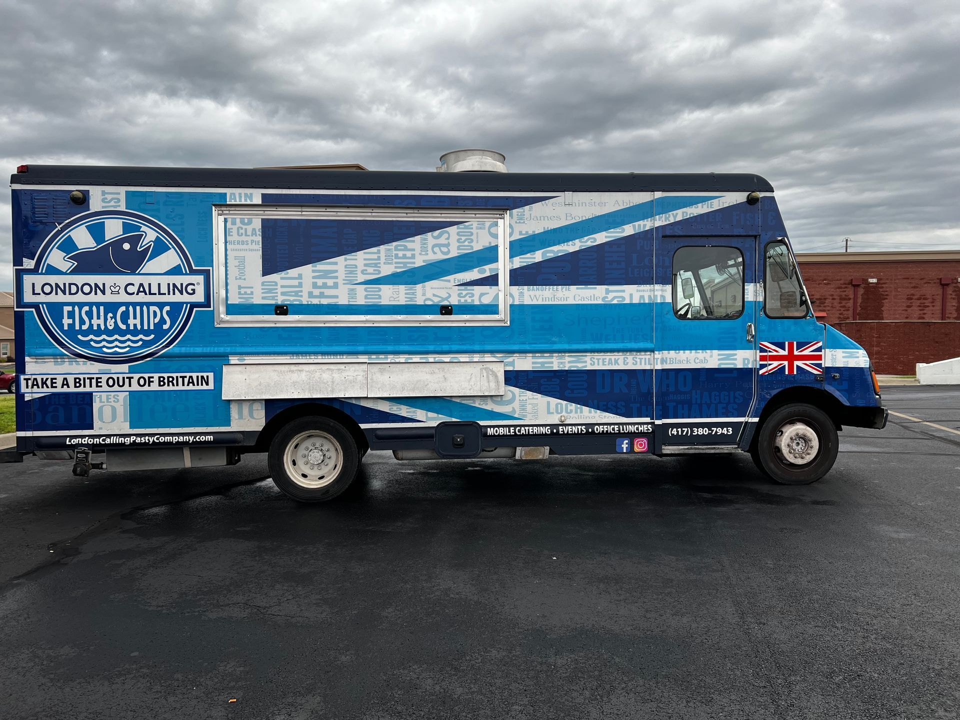 A blue and white food truck that says london calling fish chips