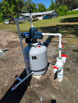 Jet pump and pressure tank at a residential wellhead, the type of system serviced during well pump r