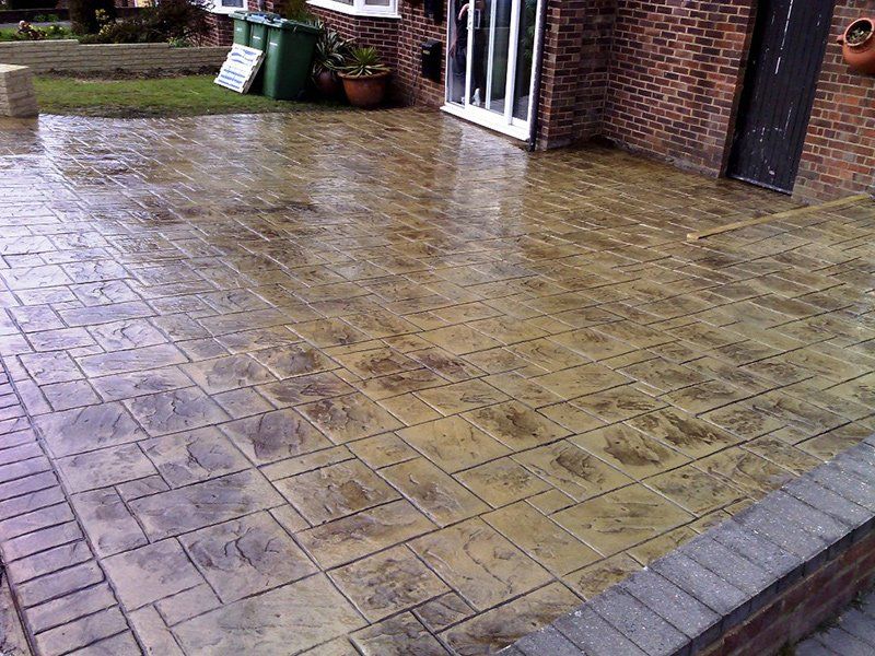 dark beige imprinted concrete Driveway in Sheffield