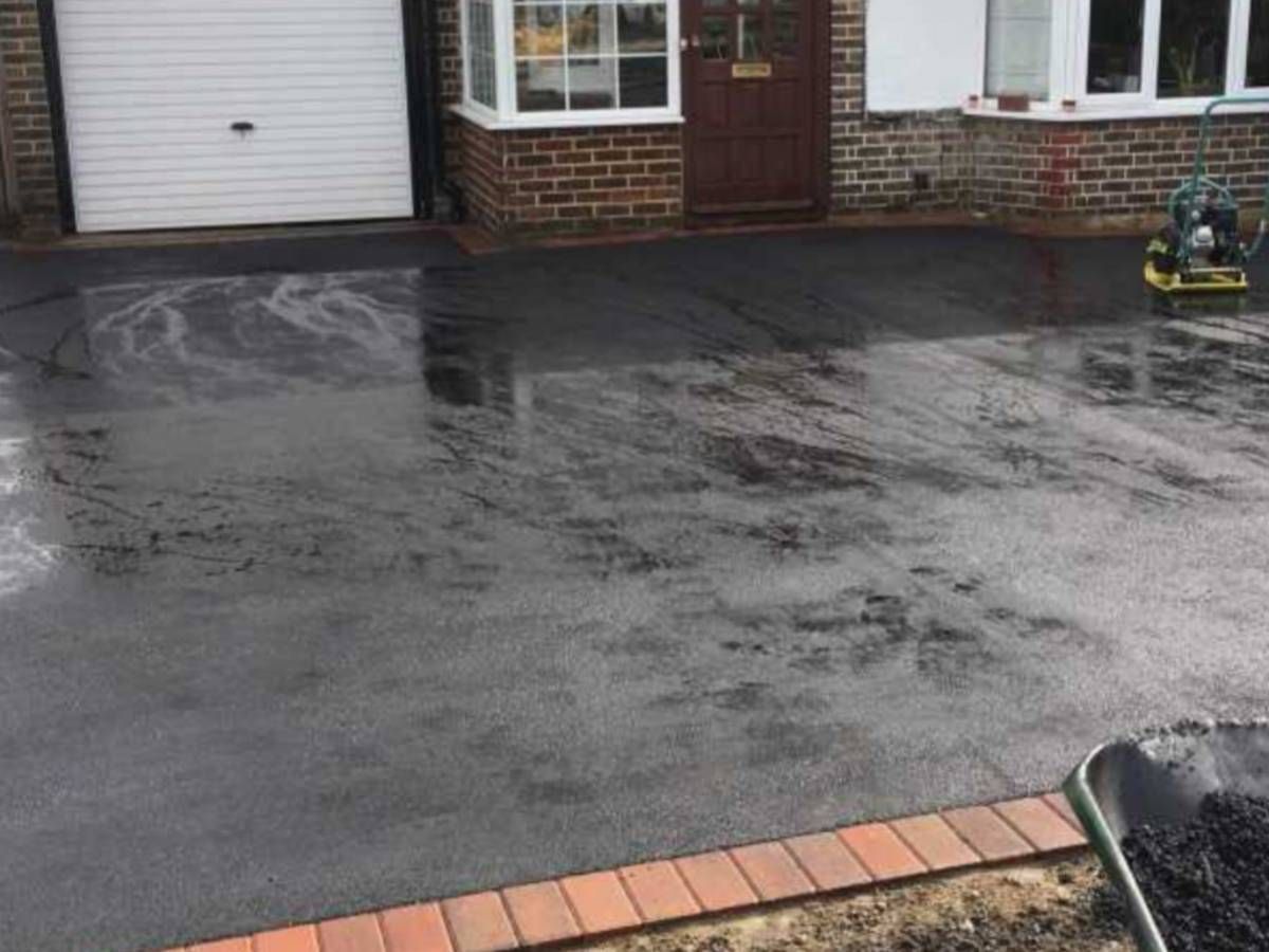 Driveways Sheffield black asphalt driveway with brindle edgings