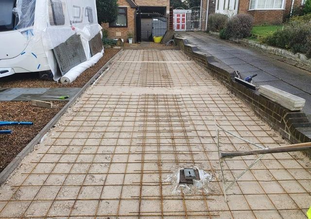 Steel rebar mesh laid across the sub-base before the concrete pour in Sheffield