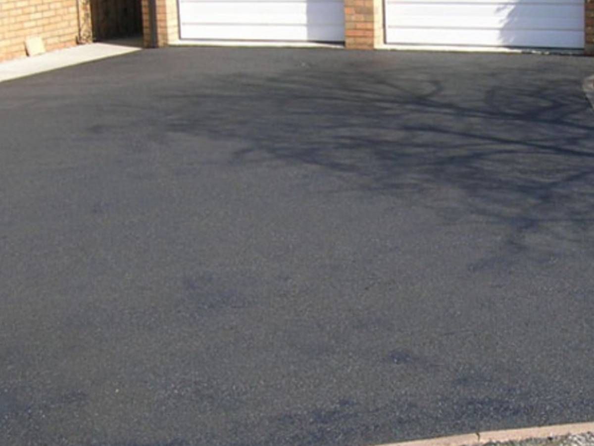 Driveways Sheffield black asphalt driveway with brindle edgings