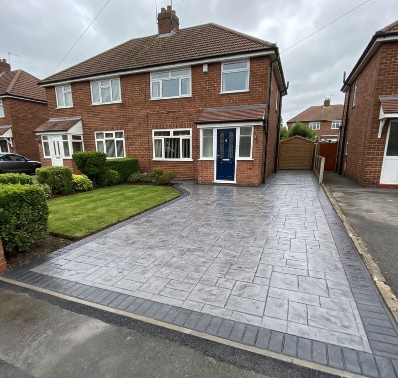 New pattern imprinted concrete driveway after installation in Woodhouse S13 Sheffield