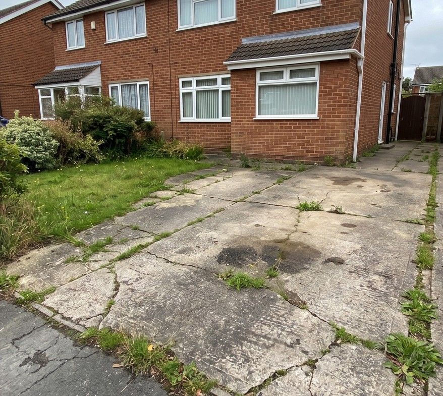 Old cracked concrete driveway before replacement in Dronfield Derbyshire