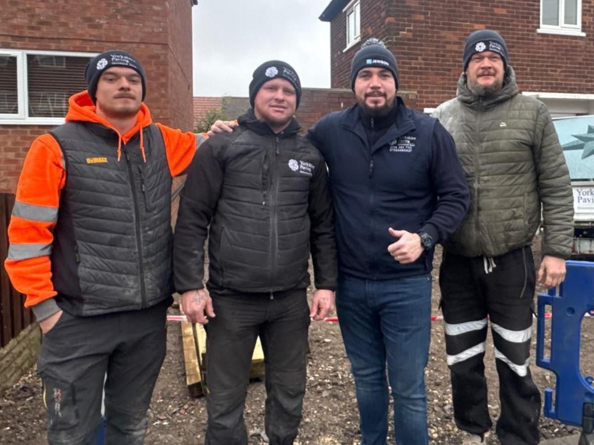 Four of the Driveways Sheffield team standing together on a job site in Sheffield
