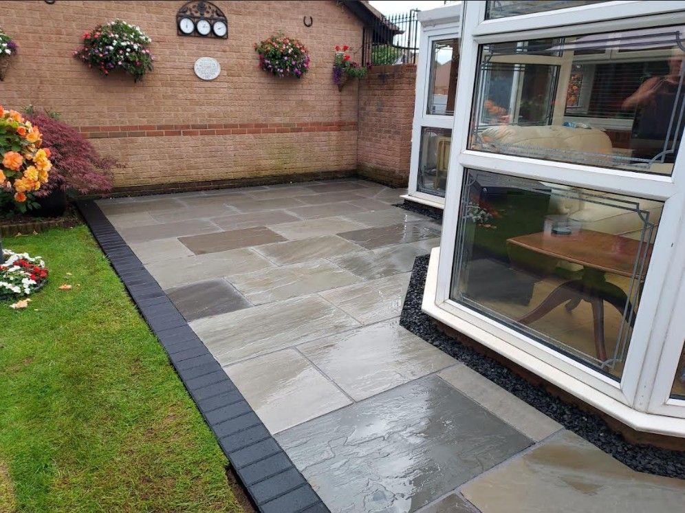 installed mixed Indian stone patio