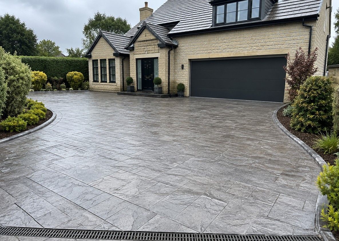 Ashlar pattern imprinted concrete driveway on a large detached property in Dore Sheffield
