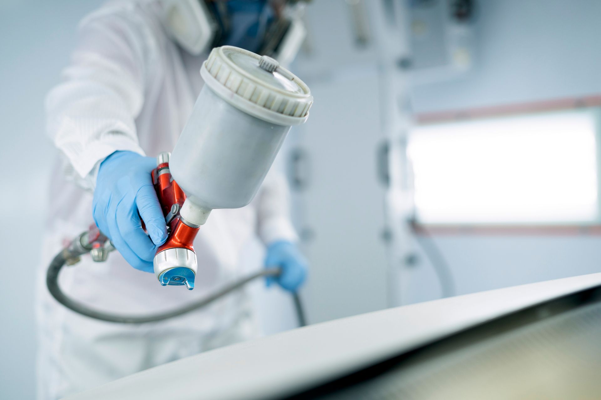 Worker Doing Car Painting — Fort Myers, FL — Clear Choice Auto Paint Supply Worker Doing Car Painting — Fort Myers, FL — Clear Choice Auto Paint Supply