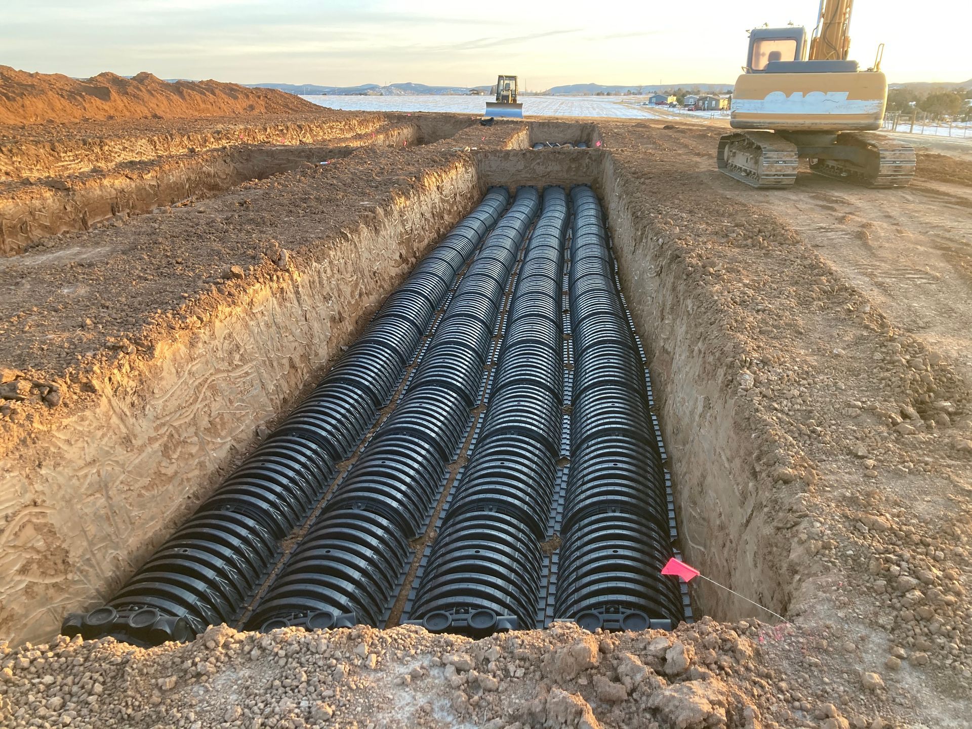 Sunnyside Gravel and Excavation, contractors in Durango CO La Plata county grading and rock work, septic systems, irrigation, stream bed, pond contractors