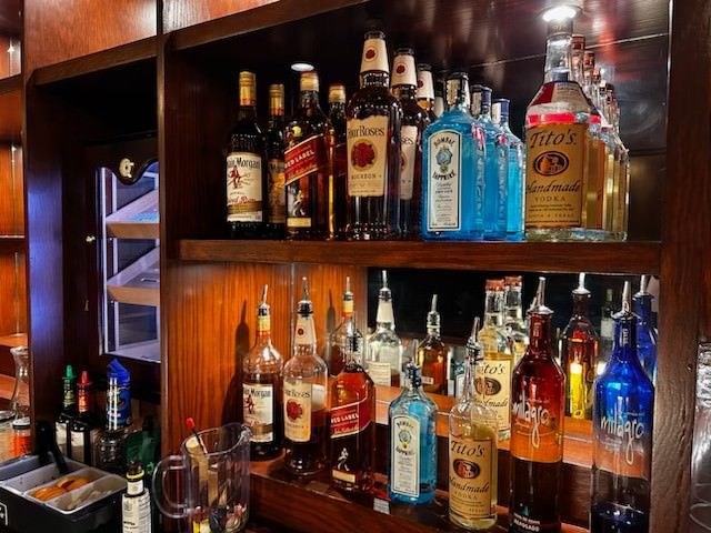 A Bar Filled with Lots of Bottles of Liquor - Lee’s Summit, MO - Top Shelf Bartending Services, LLC