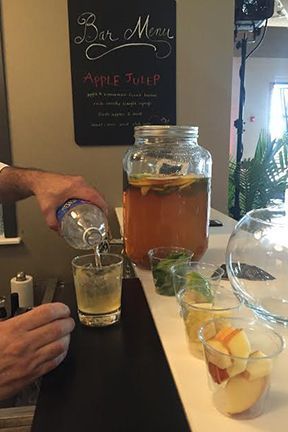 A Bartender Is Pouring a Drink Into a Shot Glass - Lee’s Summit, MO - Top Shelf Bartending Services, LLC