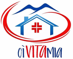 Logo Vitamia con una casa blu stilizzata, una croce medica rossa e un tratto curvo rosso