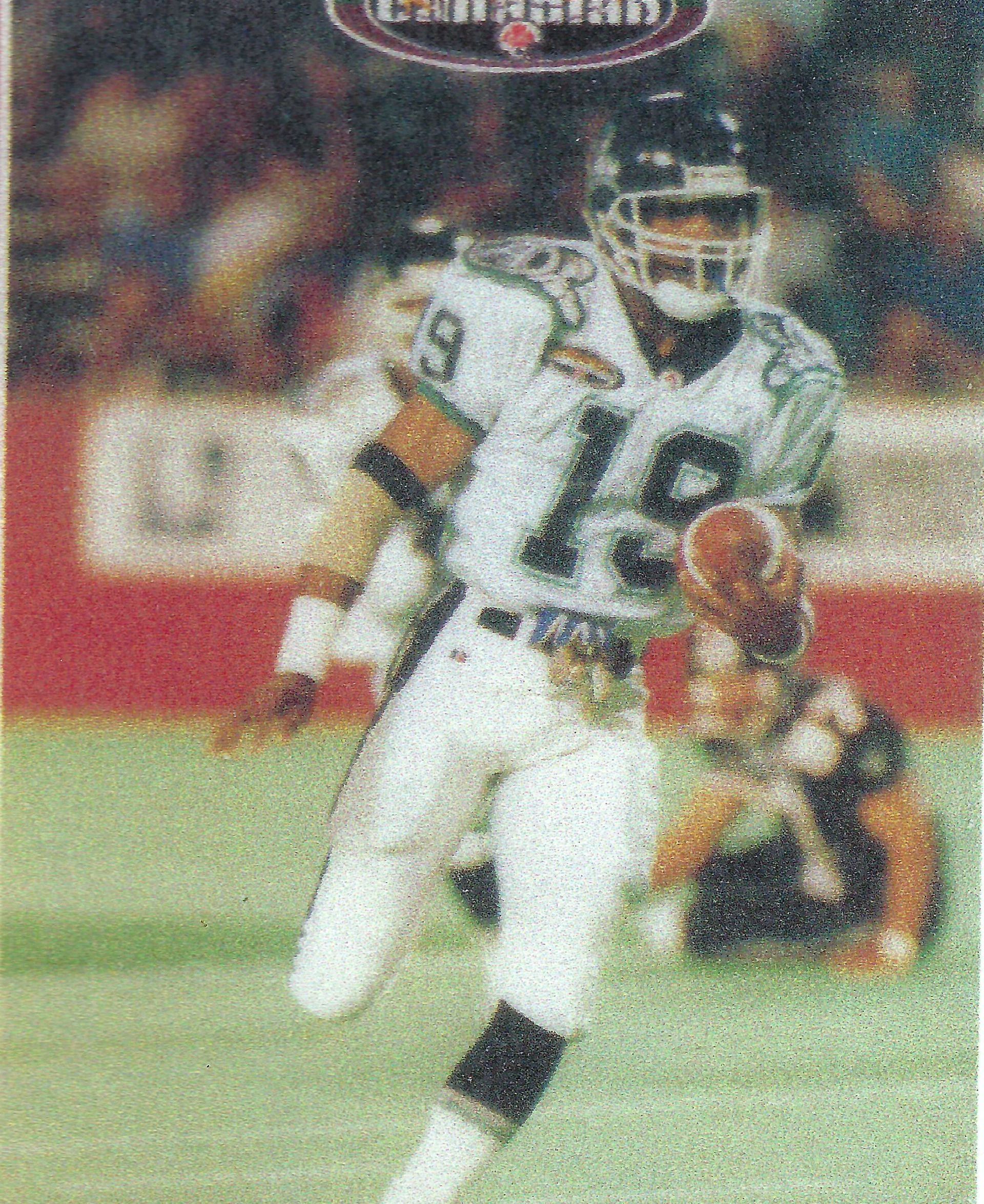 A football player with the number 12 on his jersey