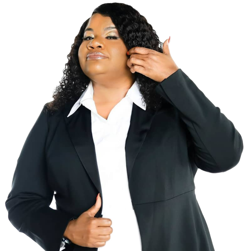 Woman in a black blazer and white shirt, hand near ear, looking to the side.