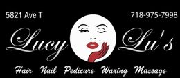Lucy Lu’s salon sign with phone number, cursive logo, and services