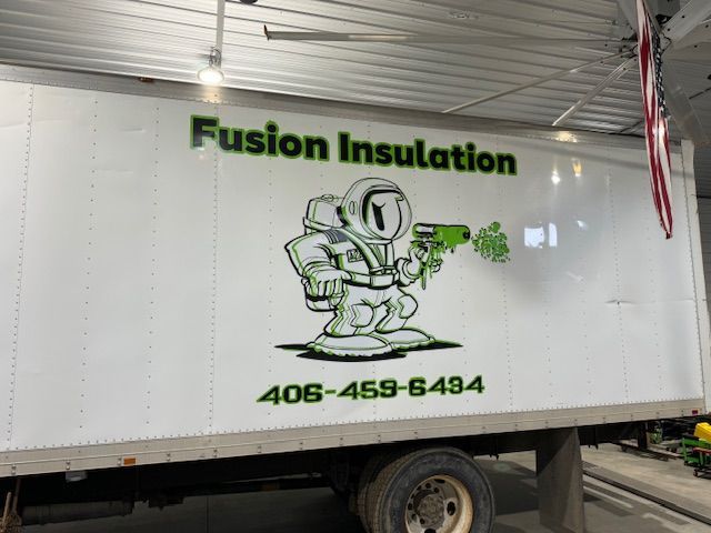 White truck with green 