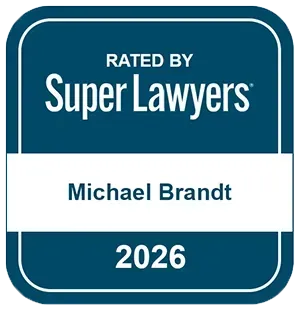 Blue badge: "Rising Stars" by Super Lawyers, Michael Brandt.