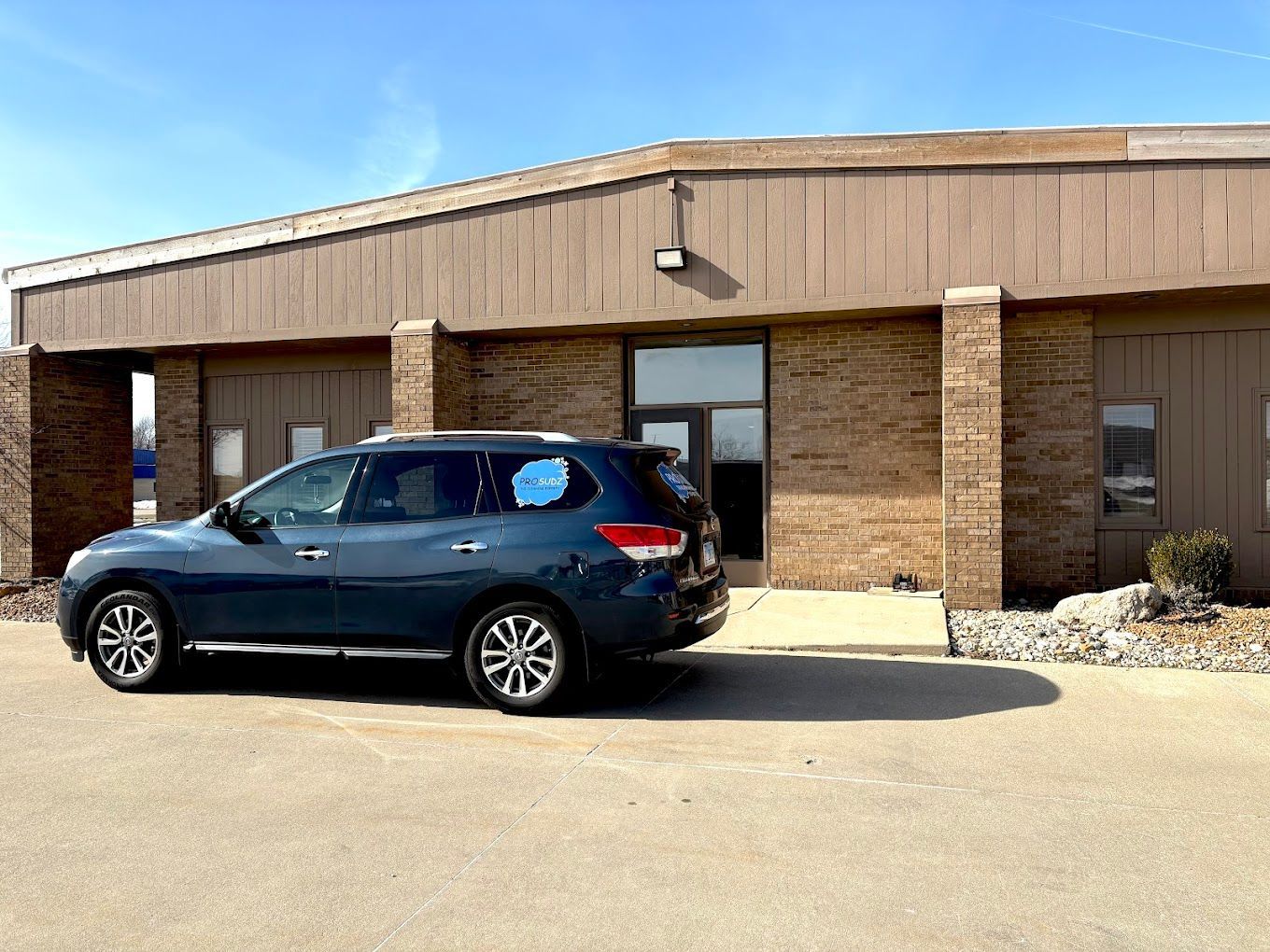 Pro Sudz branded service vehicle outside the company's Edwardsville office