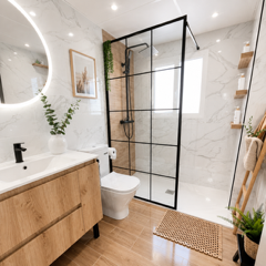Modern bathroom with wood vanity, black-framed glass shower, white marble walls, and woven floor mat