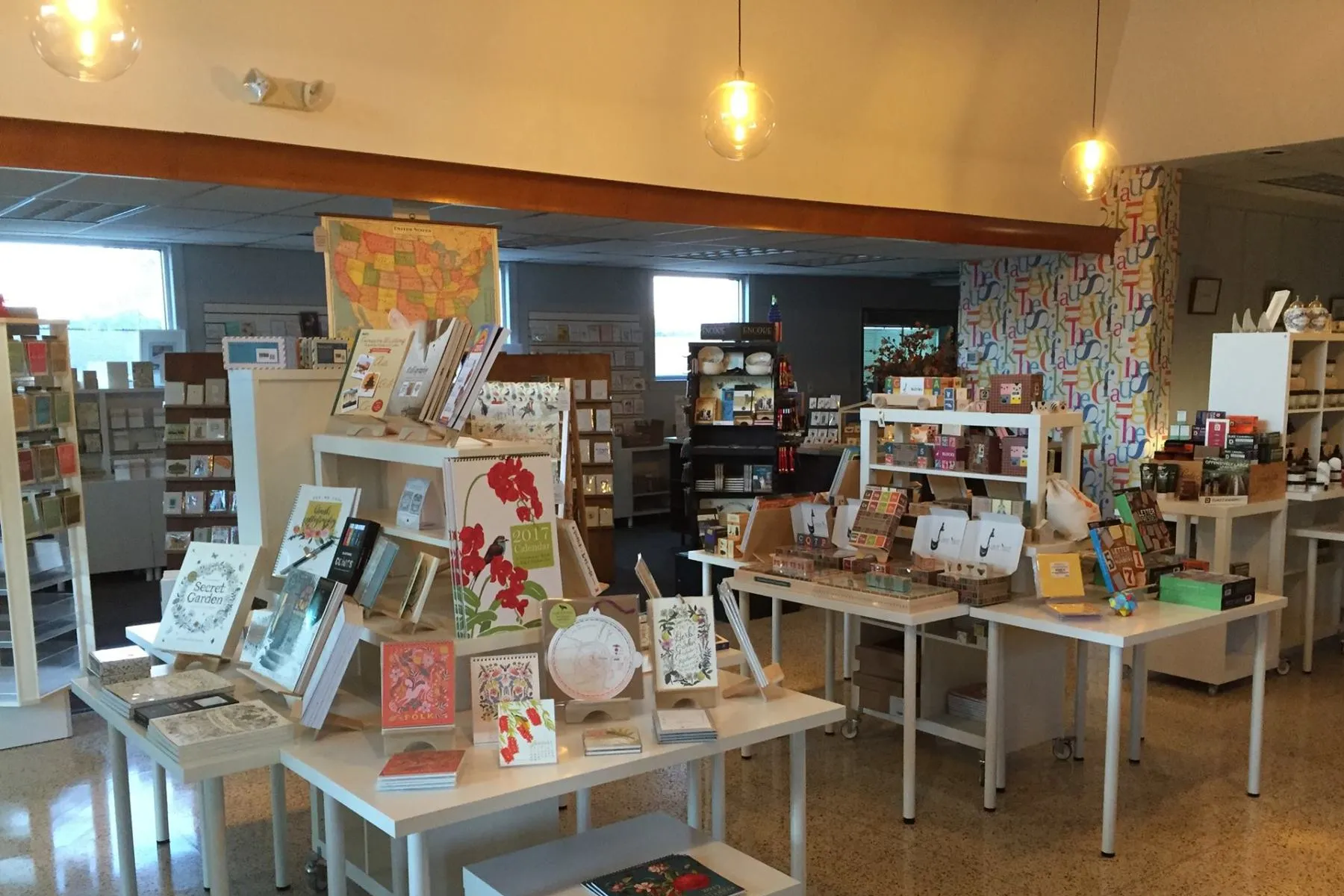 A store filled with tables and shelves filled with lots of items.