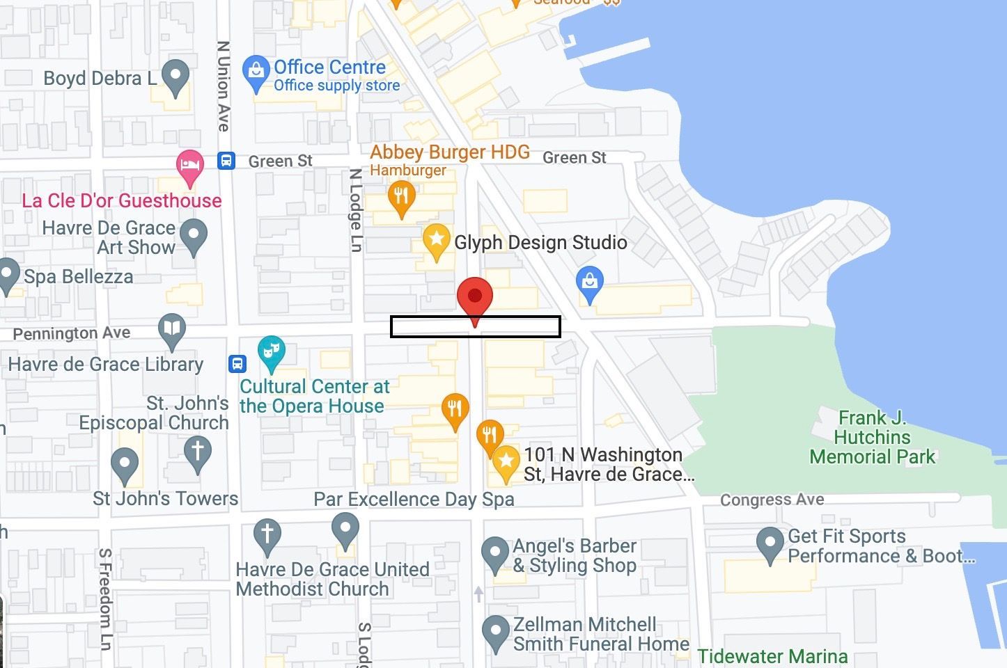 A map of a city with a red pin pointing to a location.