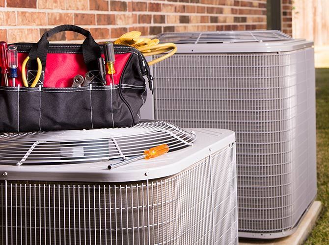 Air Condition With Tools - New Castle, PA - Central Heating & Plumbing Air Condition With Tools - New Castle, PA - Central Heating & Plumbing