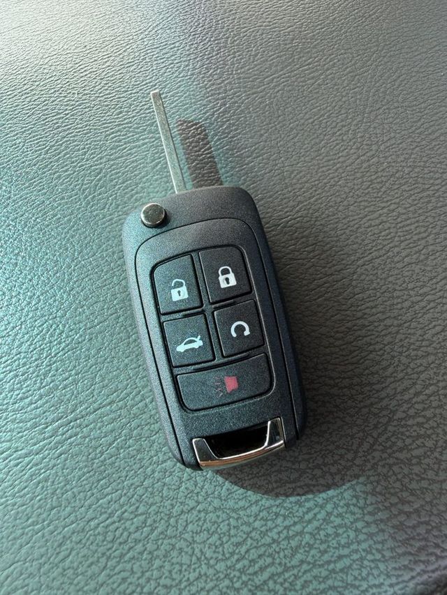 GM flip key with trunk and remote start buttons