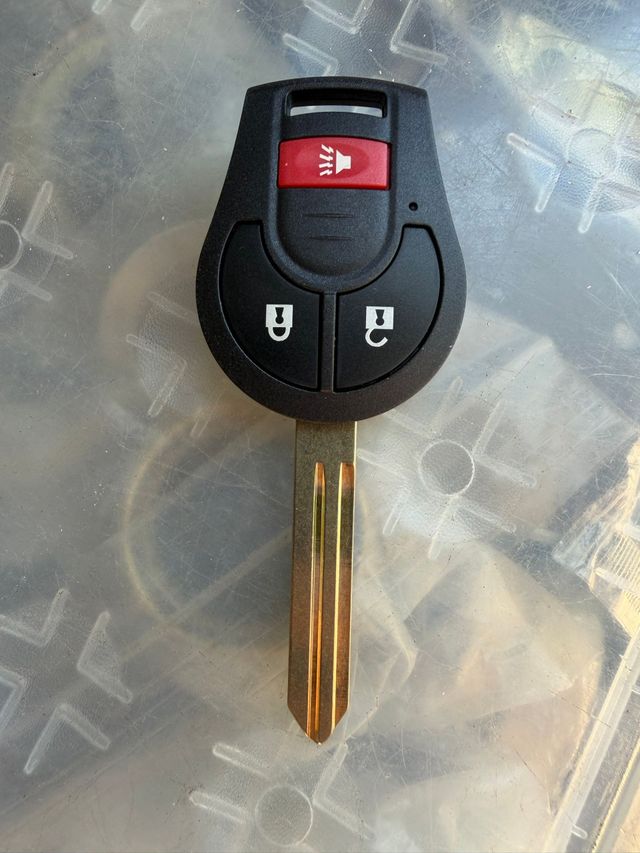 Nissan key with lock and unlock buttons