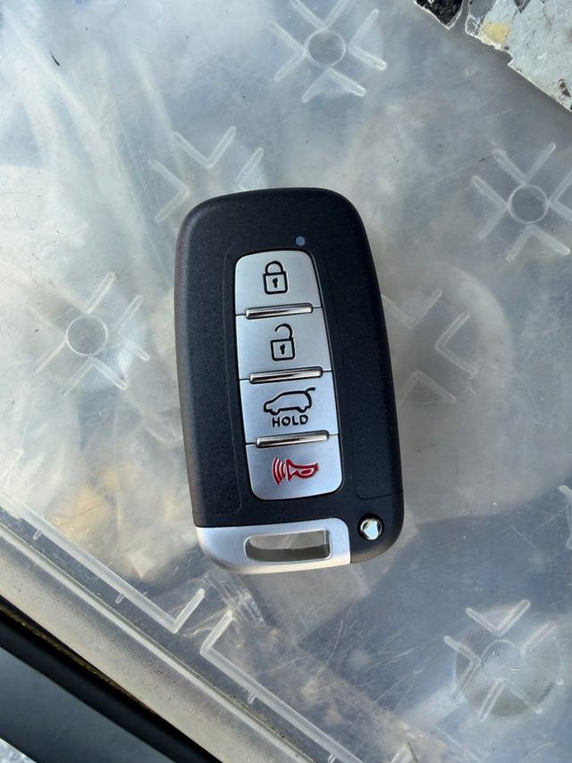 Kia smart key with lock, unlock, hatch and panic buttons