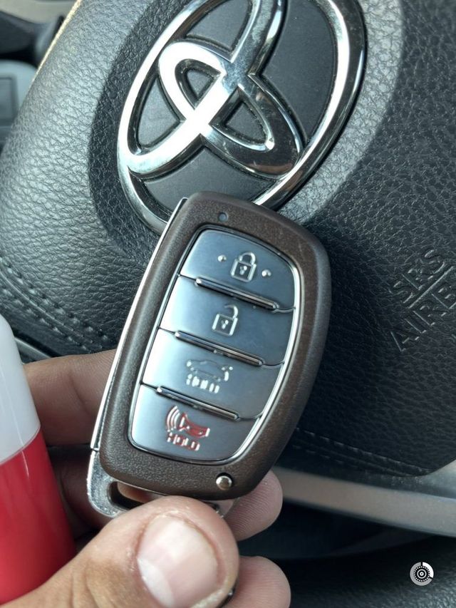 Hyundai smart key at a steering wheel