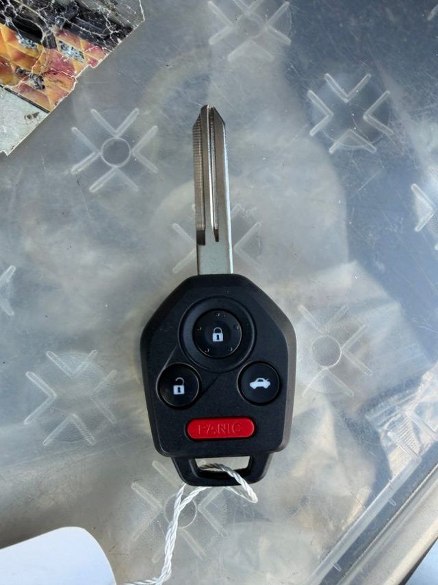 Subaru key with lock, unlock, trunk and panic buttons