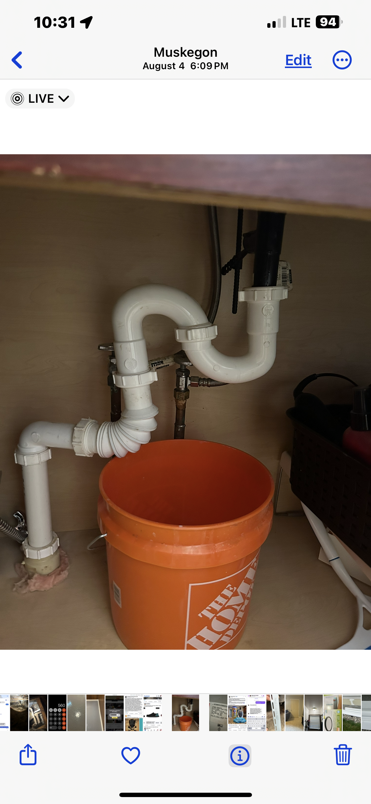 A picture of a sink with a bucket underneath it.