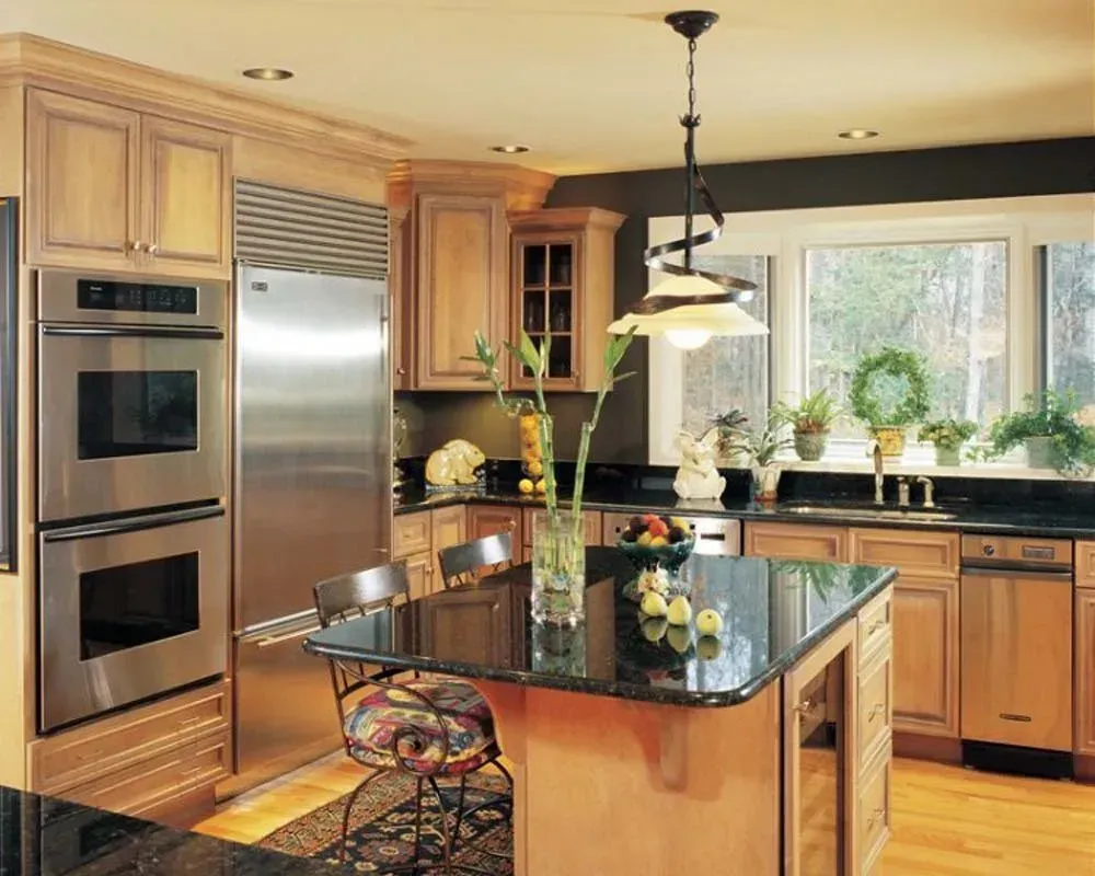 Modern kitchen with wood cabinets, stainless appliances, island, and large windows